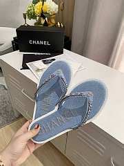 chanel flip flops with chain.